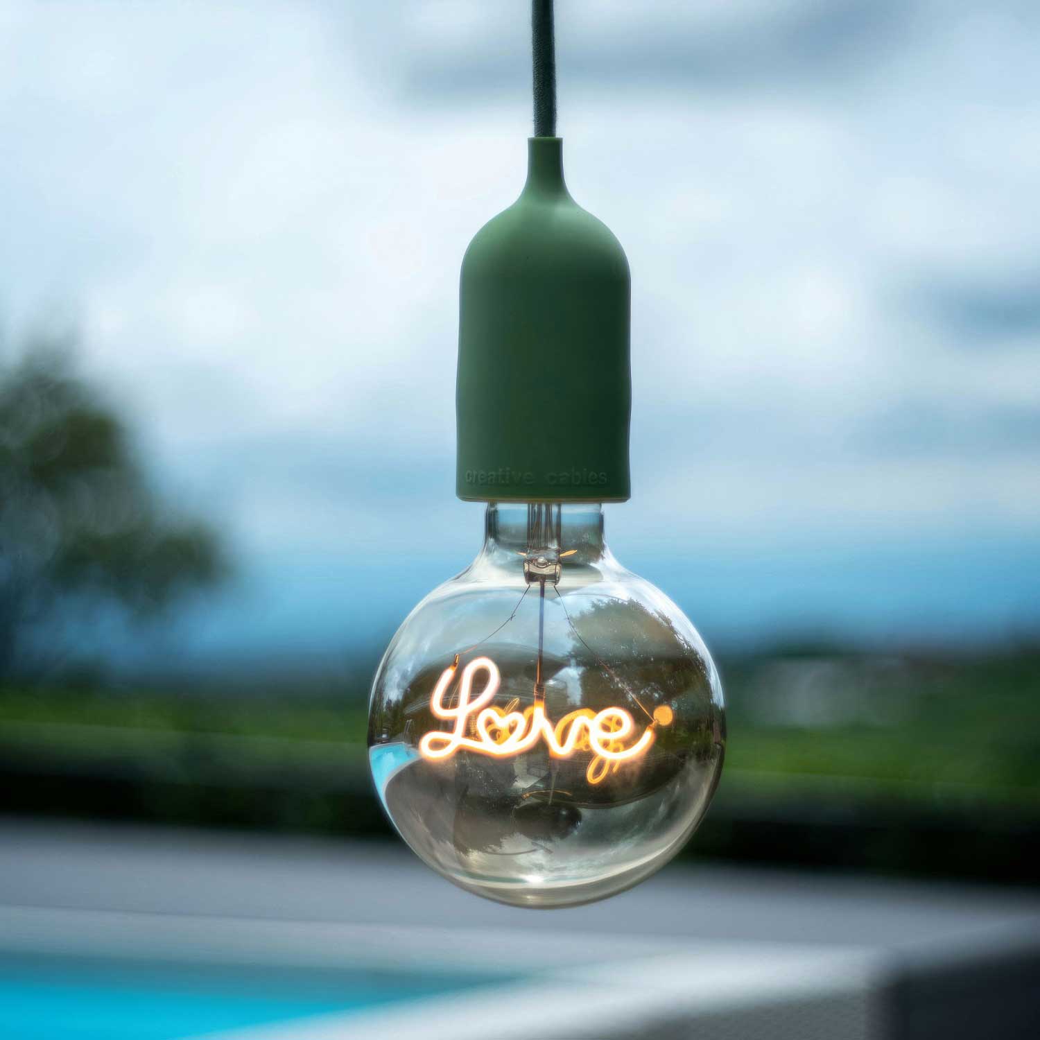 Modulair PASTEL Lampada da esterno con 1,5 m cavo tessile, rosone e portalampada in silicone IP65 waterproof - Verde prato